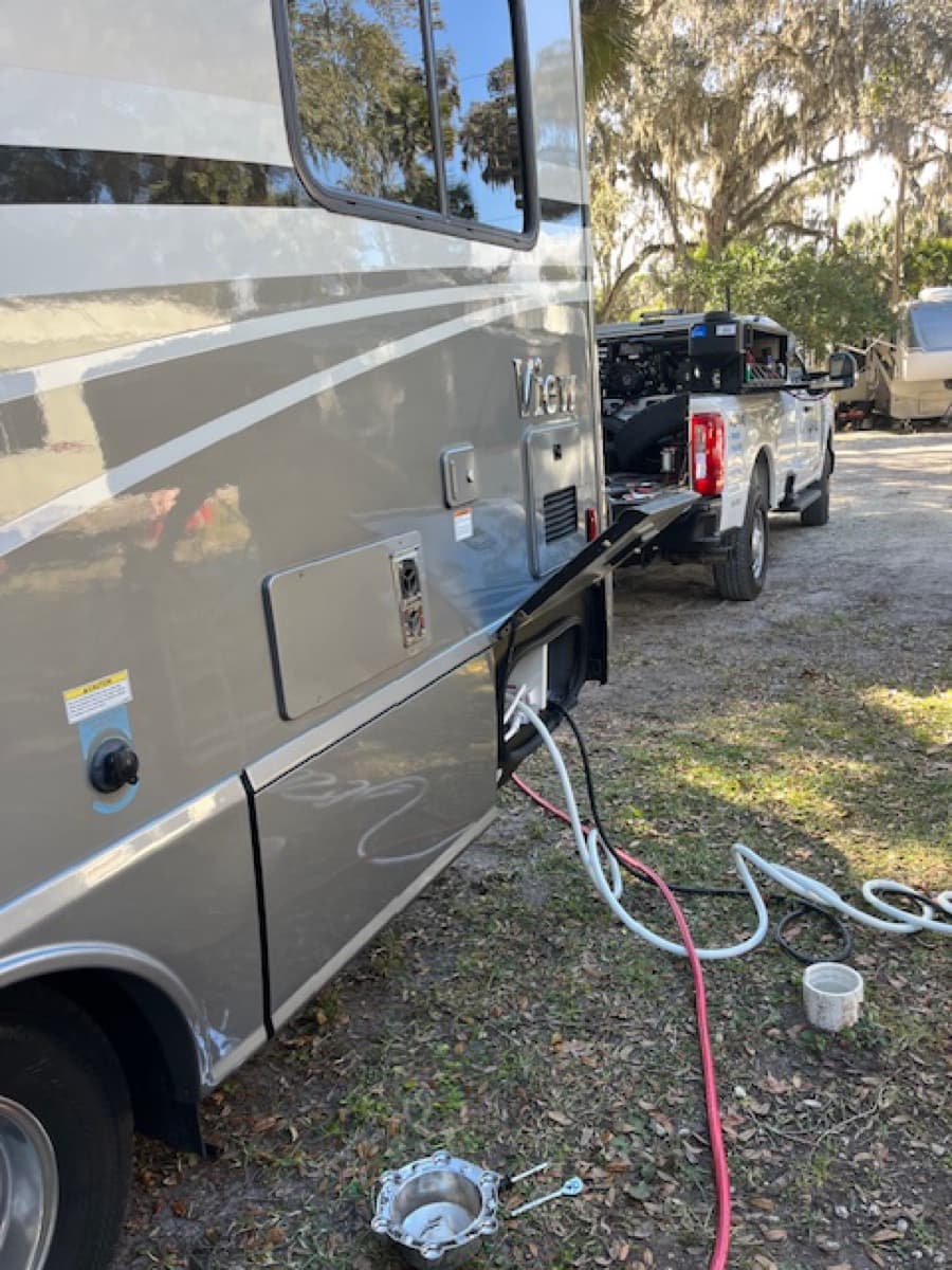 Class A motorhome exterior at an RV park in Central Florida — K & W Mobile Tire Service provides tire service at campgrounds, RV resorts, and storage lots